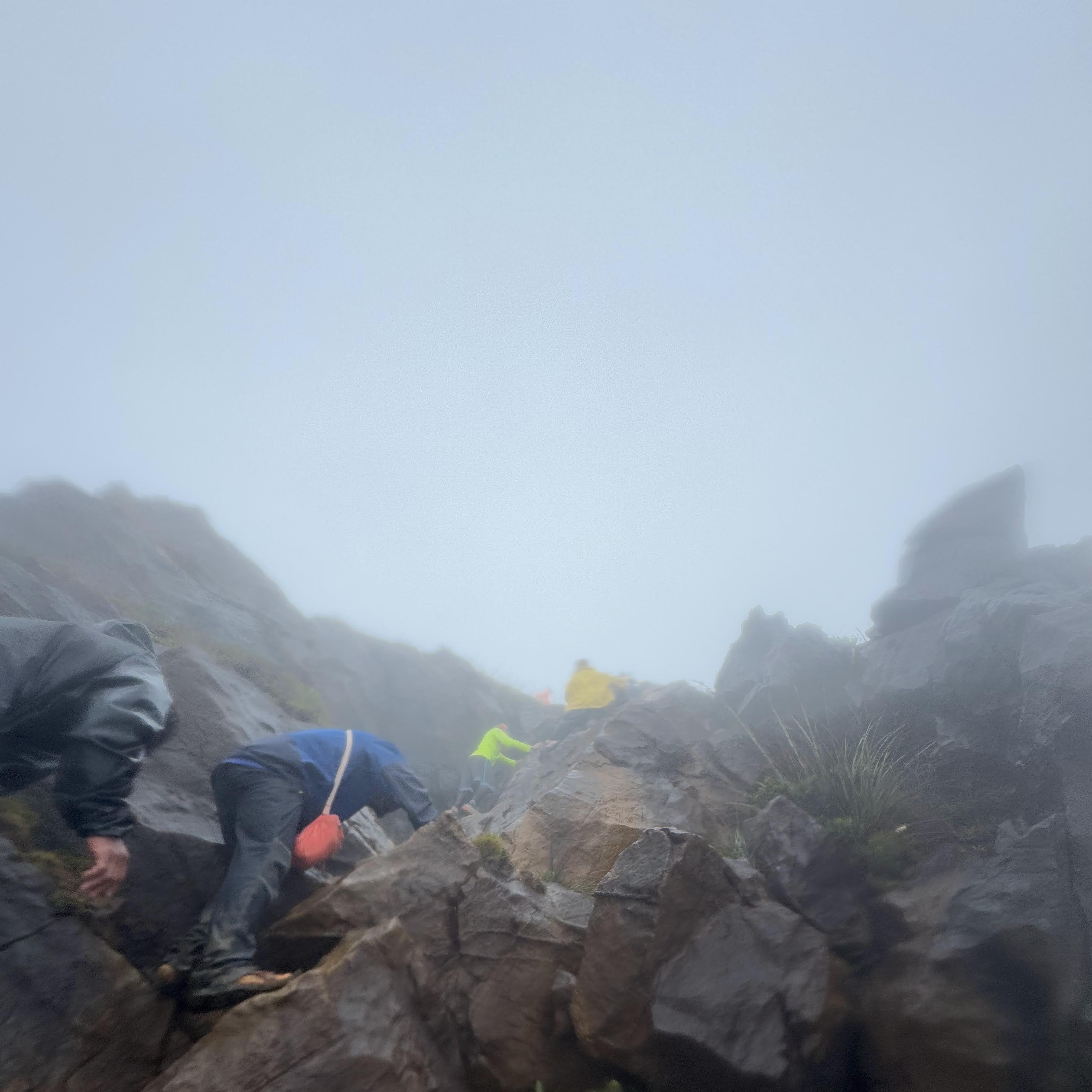 Scrambling Up Slick Trails in Heavy Rain